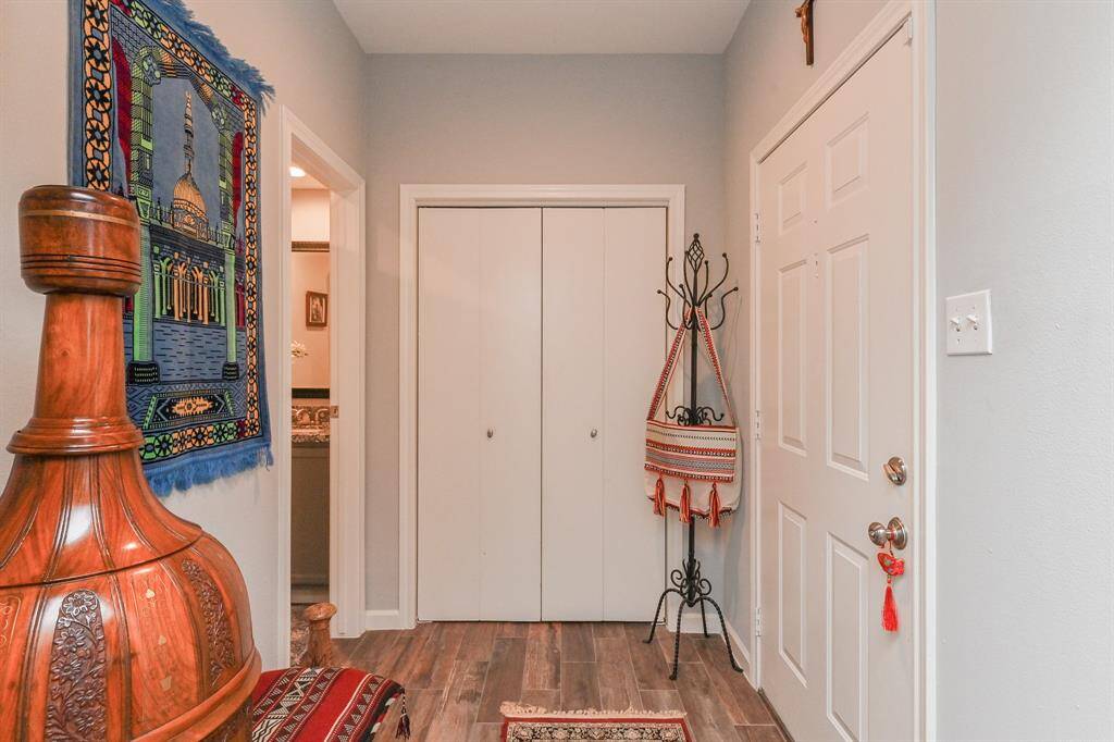 This is the entry way with half bath and coat closet.