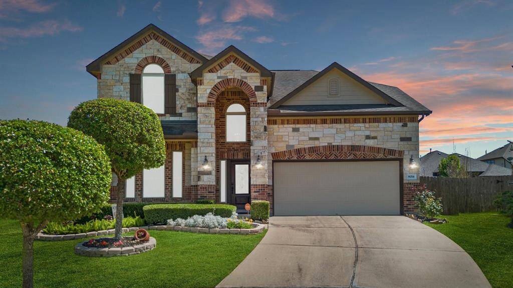 Welcome Home to 8014 Grove Sky Court!