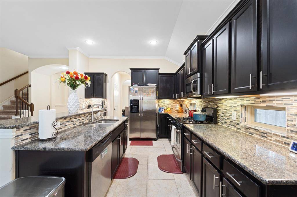 Kitchen with Granite Countertops and Windows