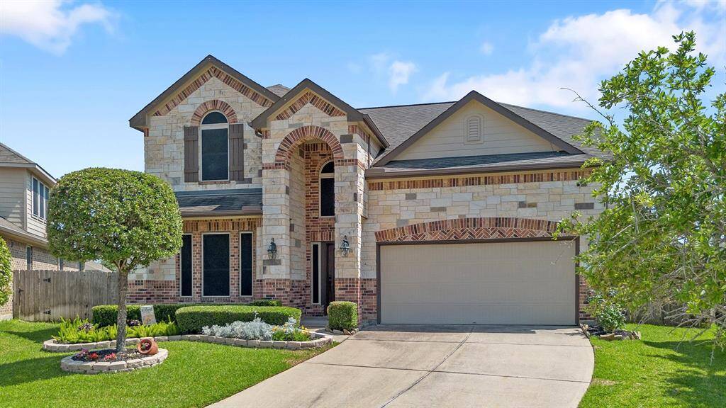 North facing with a 2 Car Garage and Beautiful Curb Appeal