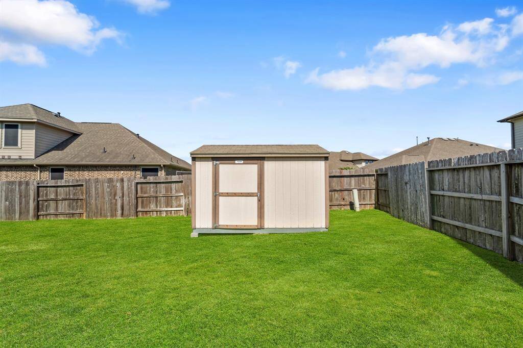 Storage Shed Included
