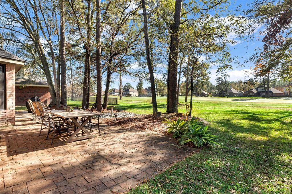 Tranquil patio with stunning golf course views.