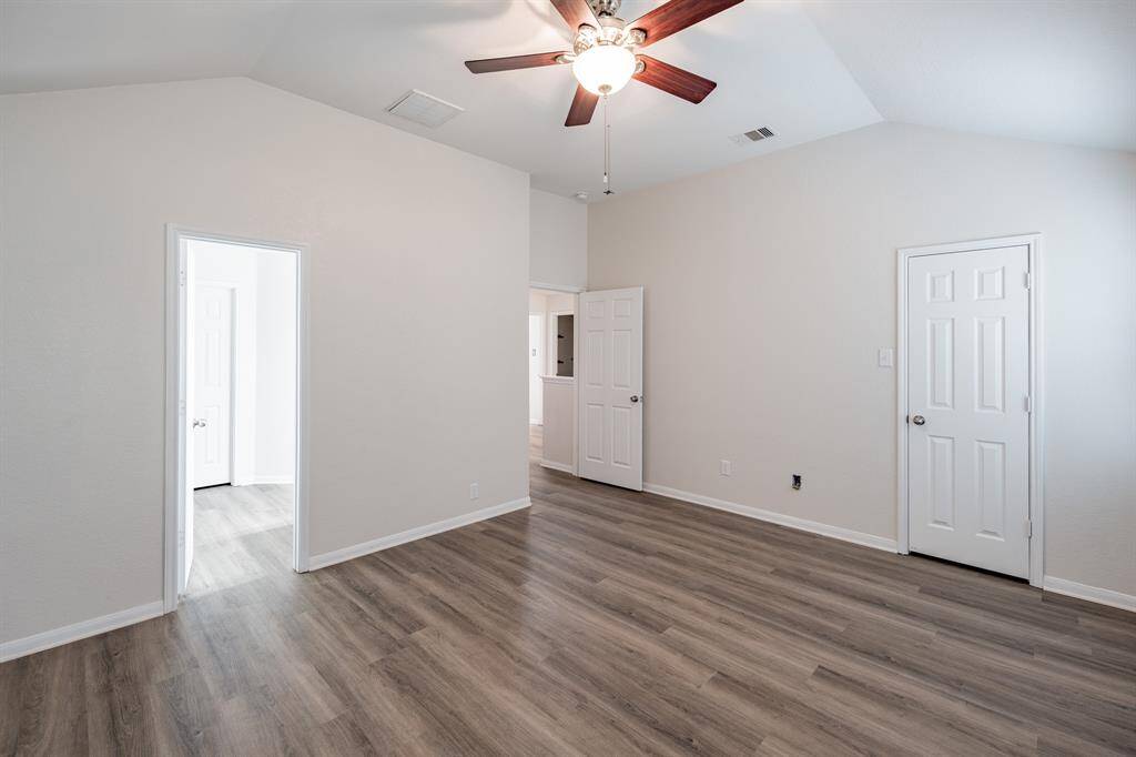 Primary Bedroom w/ Vaulted Ceilings