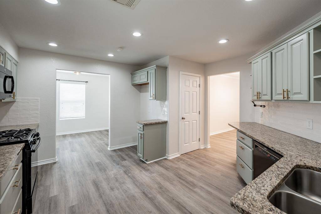 Painted Cabinets and  Vinyl Plank Flooring